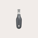 The Zyliss 2-In-1 Zester, made of stainless steel with a black ergonomic handle and a hole at the base, is an eco-friendly kitchen tool shown against a plain light background. 