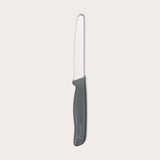 The Zyliss Tomato Knife Serrated 11cm / 4½ features a silver serrated blade and an eco-friendly handle, shown against a plain white background. 