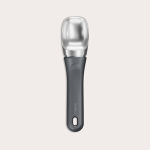 The Zyliss Ice Cream Scoop, featuring a wide deep bowl and eco-friendly handle, is displayed against a plain light background. 