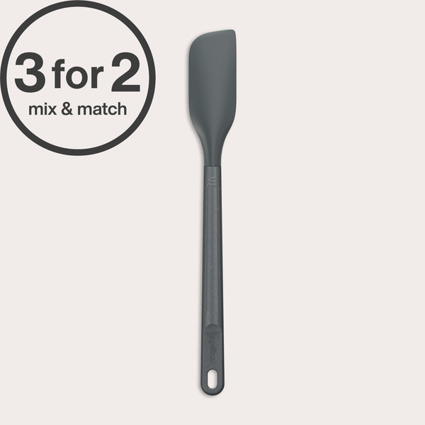 A long-handled Zyliss Spatula in dark gray with a heat-resistant silicone head is displayed on a light background. A 3 for 2 mix & match circular label appears in the top left corner.#Small