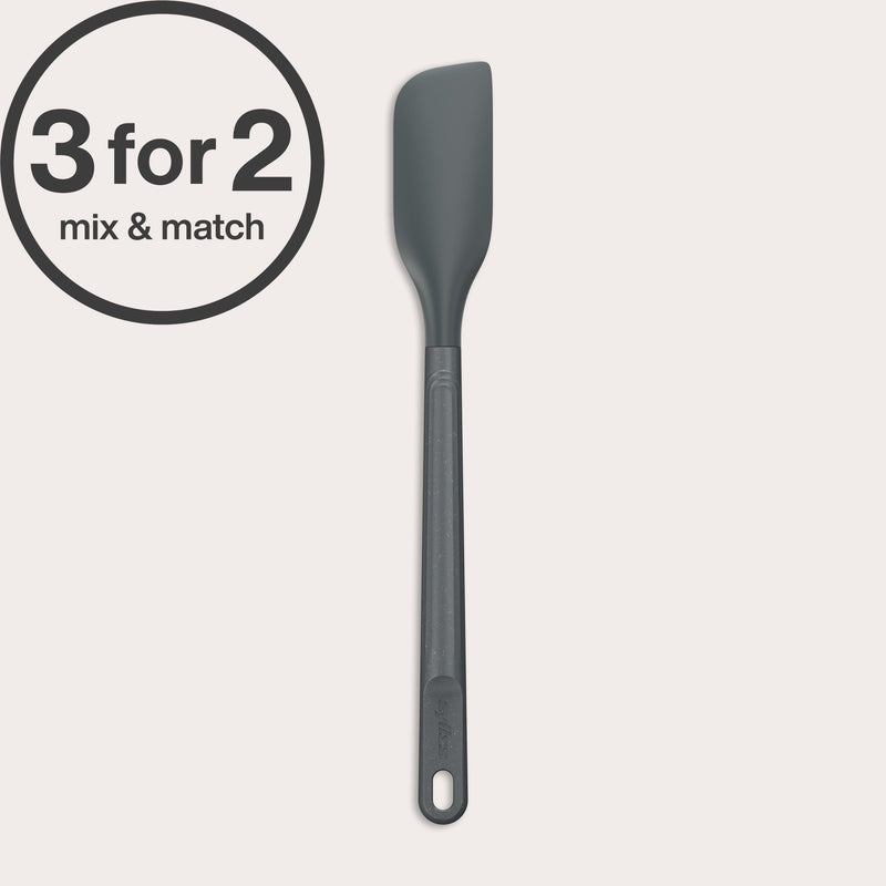 A long-handled Zyliss Spatula in dark gray with a heat-resistant silicone head is displayed on a light background. A 3 for 2 mix & match circular label appears in the top left corner.#Small